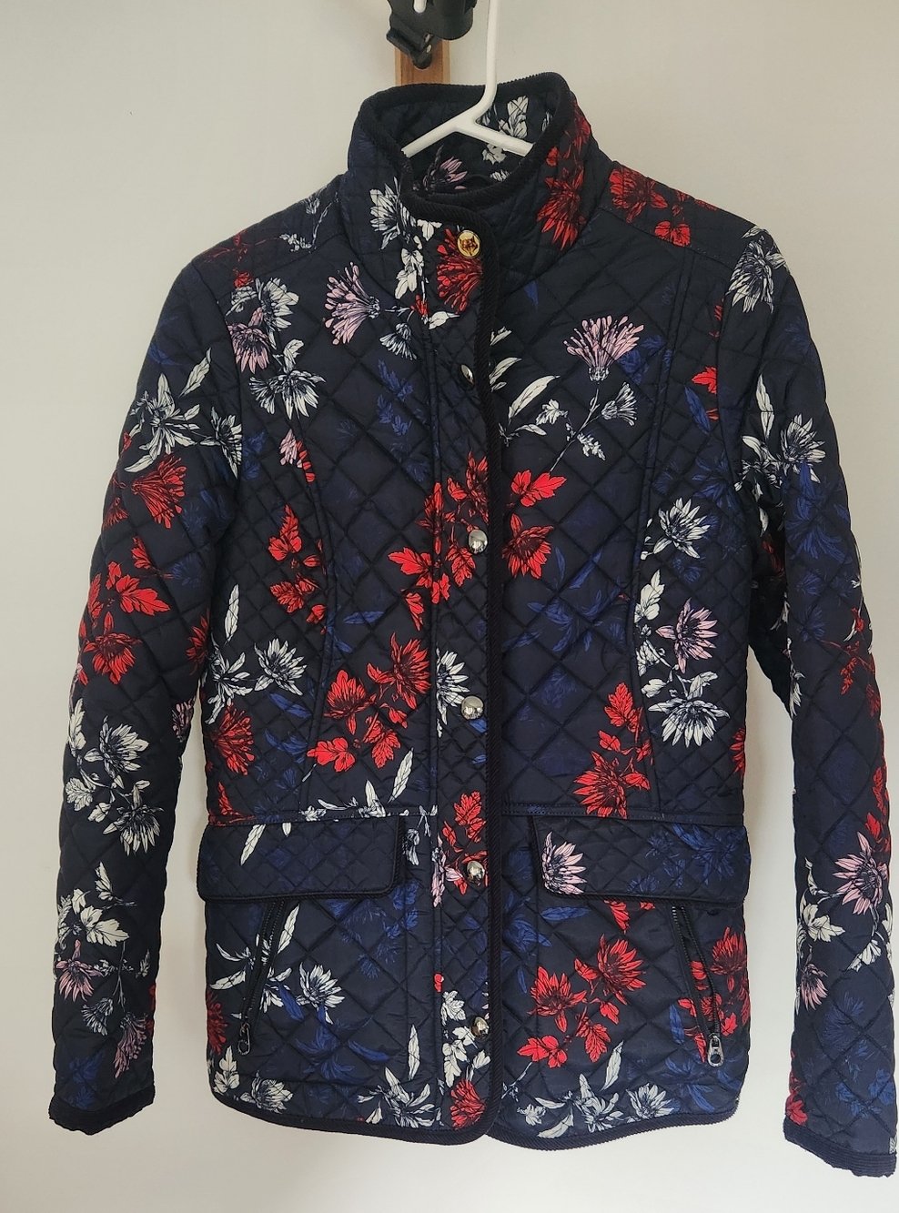 Joules Navy Quilted Floral Puffer Jacket with Red & White Blooms